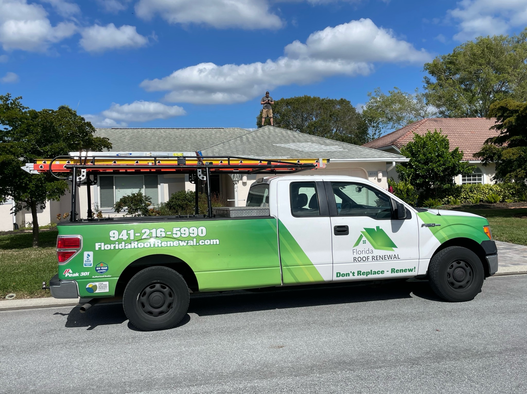 Florida Roof Renewal branded truck arriving at a customer home for a roof assessment